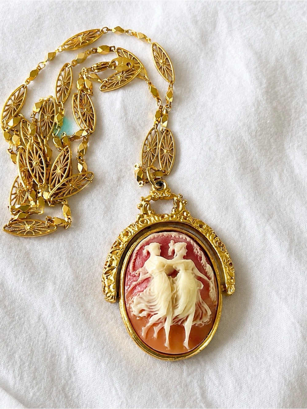 Gold-Tone Pink/Coral Cameo Pendant Necklace with Dancing Figures -